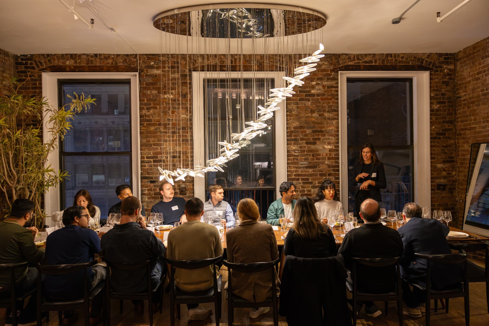Guests at a wine tasting dinner in a SoHo loft, New York